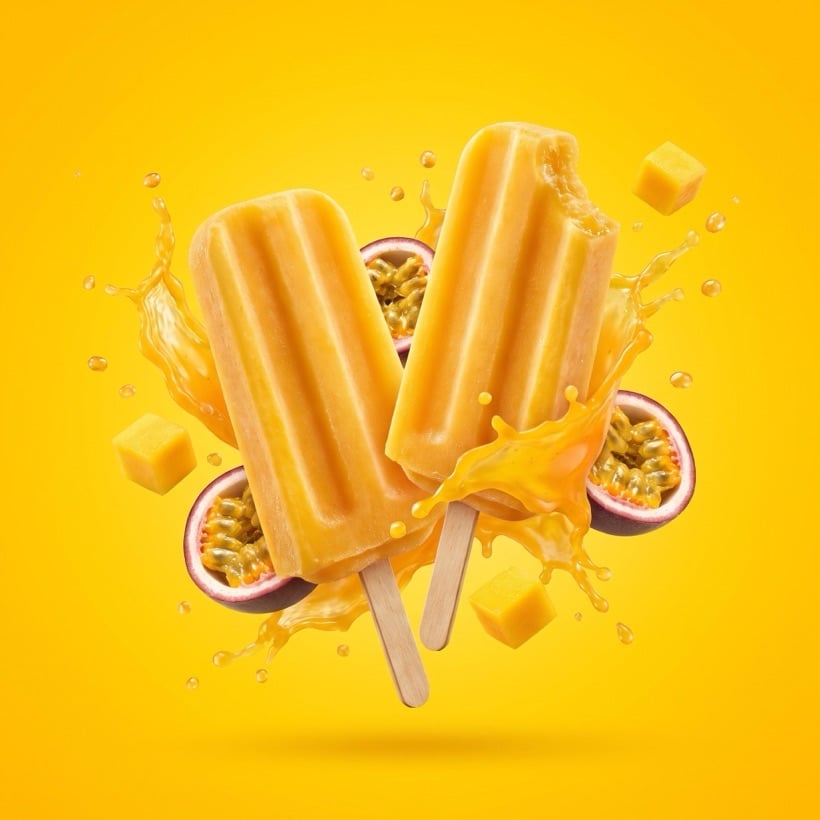 Fruit bars arranged on a bright surface with fresh fruit